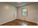 Bedroom features hardwood floors and a window providing natural light at 2270 Cresta Dr, Decatur, GA 30032