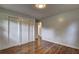 Bedroom with hardwood flooring, closet and doorway with light entering from another room at 2270 Cresta Dr, Decatur, GA 30032