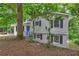 Charming exterior view of home featuring a bright blue front door and black shutters at 2270 Cresta Dr, Decatur, GA 30032