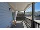Private deck with wooden railings, outdoor seating, and a view of the neighborhood at 3323 Owl Creek Pkwy, Acworth, GA 30102