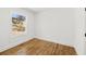 Cozy bedroom with a window view and hardwood floors at 1385 Benteen Se Way, Atlanta, GA 30315