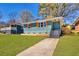 Charming home exterior with fresh green lawn at 1385 Benteen Se Way, Atlanta, GA 30315