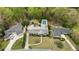 Aerial view of expansive property featuring a pool and beautifully landscaped grounds at 1724 Ridge Valley Nw Ct, Atlanta, GA 30327