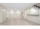 Finished basement featuring tile flooring, built in bar and ample storage at 1724 Ridge Valley Nw Ct, Atlanta, GA 30327