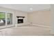Basement with fireplace and walk-out to outdoor patio at 1724 Ridge Valley Nw Ct, Atlanta, GA 30327