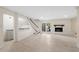 Finished basement with tiled floors, fireplace, bar area and walkout to the exterior at 1724 Ridge Valley Nw Ct, Atlanta, GA 30327