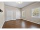 Bright bedroom with hardwood floors, natural light and large closets at 1724 Ridge Valley Nw Ct, Atlanta, GA 30327