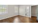 Bedroom with hardwood floors, natural light and ensuite bathroom at 1724 Ridge Valley Nw Ct, Atlanta, GA 30327