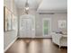 Elegant foyer with hardwood floors, high ceilings, and an arched doorway at 1724 Ridge Valley Nw Ct, Atlanta, GA 30327
