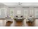 Spacious living room with hardwood floors, ample seating, and abundant natural light at 1724 Ridge Valley Nw Ct, Atlanta, GA 30327