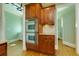 Gourmet kitchen with stainless steel double ovens and custom wooden cabinetry. Granite countertops at 981 Cranbrook Glen Ln, Snellville, GA 30078