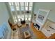 Beautiful living room with high ceilings, fireplace, and built-in bookshelves; airy and open concept at 981 Cranbrook Glen Ln, Snellville, GA 30078