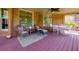 Cozy screened porch featuring ceiling fan, perfect for relaxation at 981 Cranbrook Glen Ln, Snellville, GA 30078