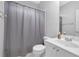 Bathroom with white vanity and tub shower at 5355 Avonshire Ln, Cumming, GA 30040