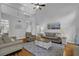 Large living room with a high ceiling, offering a spacious and open feel at 5355 Avonshire Ln, Cumming, GA 30040