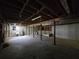 Unfinished basement with concrete floors and utility connections; ideal for customization or storage at 621 Hood Rd, Stockbridge, GA 30281