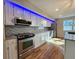 Close up view of the kitchen featuring stainless steel appliances and granite countertops at 621 Hood Rd, Stockbridge, GA 30281