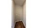 A small laundry room with hardwood floors and painted walls at 621 Hood Rd, Stockbridge, GA 30281