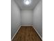 Walk-in closet with hardwood flooring offers plenty of storage space at 621 Hood Rd, Stockbridge, GA 30281