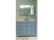 Vanity with light blue cabinets, marble countertop, and chrome hardware at 30 Woodbrook Ct, Mcdonough, GA 30252