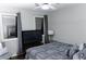 Bedroom featuring a ceiling fan, light gray walls, and a modern design at 30 Woodbrook Ct, Mcdonough, GA 30252