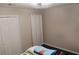 bedroom with modern lighting, closet, and luxury vinyl plank floors at 30 Woodbrook Ct, Mcdonough, GA 30252