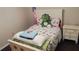 bedroom with bed, nightstand, and hardwood floors at 30 Woodbrook Ct, Mcdonough, GA 30252