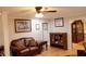Cozy living room showcasing hardwood floors, comfortable seating, and elegant decor at 30 Woodbrook Ct, Mcdonough, GA 30252