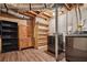 Unfinished basement with washer, dryer, and shelving at 950 Ivy St, Cumming, GA 30041