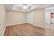 Neutral bedroom with wood floors and ample closet space at 950 Ivy St, Cumming, GA 30041