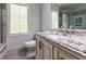 Elegant bathroom with granite countertop, stylish vanity, and tiled shower with glass door at 3107 Sandhurst Dr, Woodstock, GA 30189