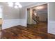 Formal dining room with beautiful hardwood floors and detailed trim work at 3107 Sandhurst Dr, Woodstock, GA 30189