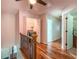 Upstairs hallway features a laundry closet with a modern washer and dryer at 3107 Sandhurst Dr, Woodstock, GA 30189