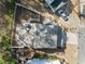 Aerial view of a home highlighting a new roof, tidy landscaping, and long driveway at 3465 Maple Valley Dr, Cumming, GA 30040