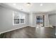 Bright bonus room with sliding doors leading to the backyard, modern finishes, and ample natural light at 3465 Maple Valley Dr, Cumming, GA 30040