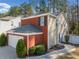 Attractive home with brick and siding, featuring a two-car garage and landscaped walkway at 3465 Maple Valley Dr, Cumming, GA 30040