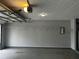 Spacious two car garage with functional lighting, storage racks and plenty of room at 3465 Maple Valley Dr, Cumming, GA 30040
