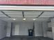 Well lit garage showcasing storage solutions, work space, and a durable floor at 3465 Maple Valley Dr, Cumming, GA 30040