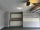 Clean garage with ample storage space, cabinets, and organizational features at 3465 Maple Valley Dr, Cumming, GA 30040