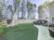 Well maintained backyard features lush artificial turf and a cozy seating area, great for relaxing and entertaining at 3822 Harris Nw Blvd, Kennesaw, GA 30144