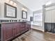 Bathroom with double vanity and soaking tub under a window at 3822 Harris Nw Blvd, Kennesaw, GA 30144