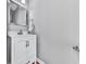 Modern half-bathroom with a white vanity and marble countertop at 3822 Harris Nw Blvd, Kennesaw, GA 30144