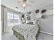Cozy bedroom with flower decorations and a window at 3822 Harris Nw Blvd, Kennesaw, GA 30144