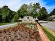 The attractive entrance to Legacy Park, with a floral display at 3822 Harris Nw Blvd, Kennesaw, GA 30144