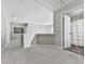 Upstairs hallway with carpet and a doorway to a bathroom at 3822 Harris Nw Blvd, Kennesaw, GA 30144