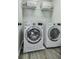 Bright laundry room featuring a modern washer and dryer at 3822 Harris Nw Blvd, Kennesaw, GA 30144