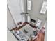 Bright living room with a fireplace, modern ceiling fan, and hardwood floors at 3822 Harris Nw Blvd, Kennesaw, GA 30144