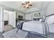 Spacious main bedroom with vaulted ceiling, ceiling fan, and large bed at 3822 Harris Nw Blvd, Kennesaw, GA 30144