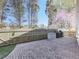 Large patio area with a brick surface, ideal for barbecues and enjoying outdoor living at 3822 Harris Nw Blvd, Kennesaw, GA 30144