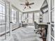 Sunroom features large windows, vaulted ceilings, and modern decor at 3822 Harris Nw Blvd, Kennesaw, GA 30144
